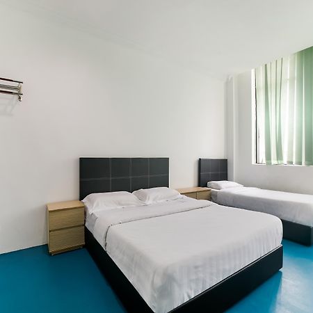 Spot On 89726 Capsule Inn Кота Кинабалу Екстериор снимка