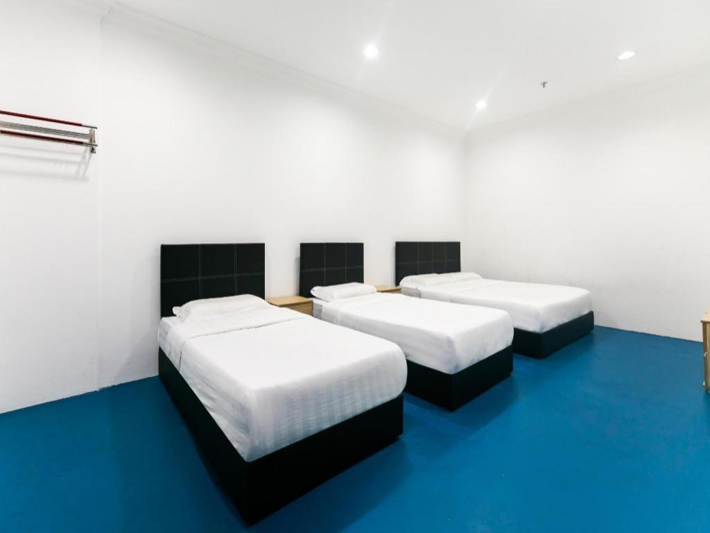 Spot On 89726 Capsule Inn Кота Кинабалу Екстериор снимка