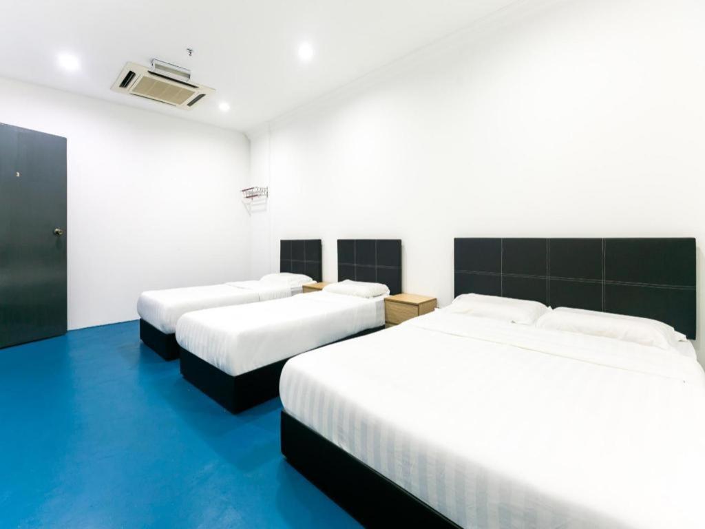 Spot On 89726 Capsule Inn Кота Кинабалу Екстериор снимка