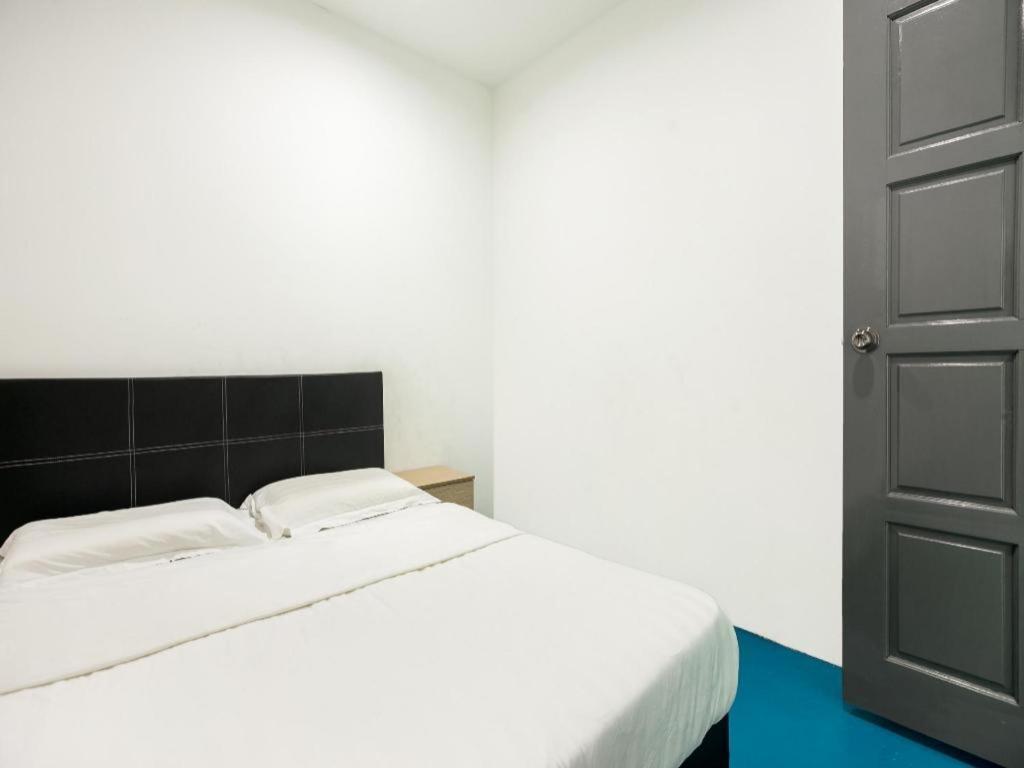 Spot On 89726 Capsule Inn Кота Кинабалу Екстериор снимка