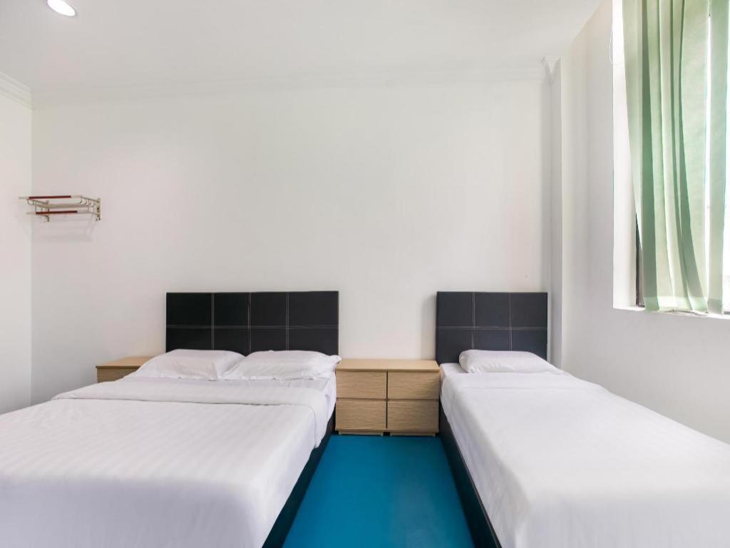 Spot On 89726 Capsule Inn Кота Кинабалу Екстериор снимка