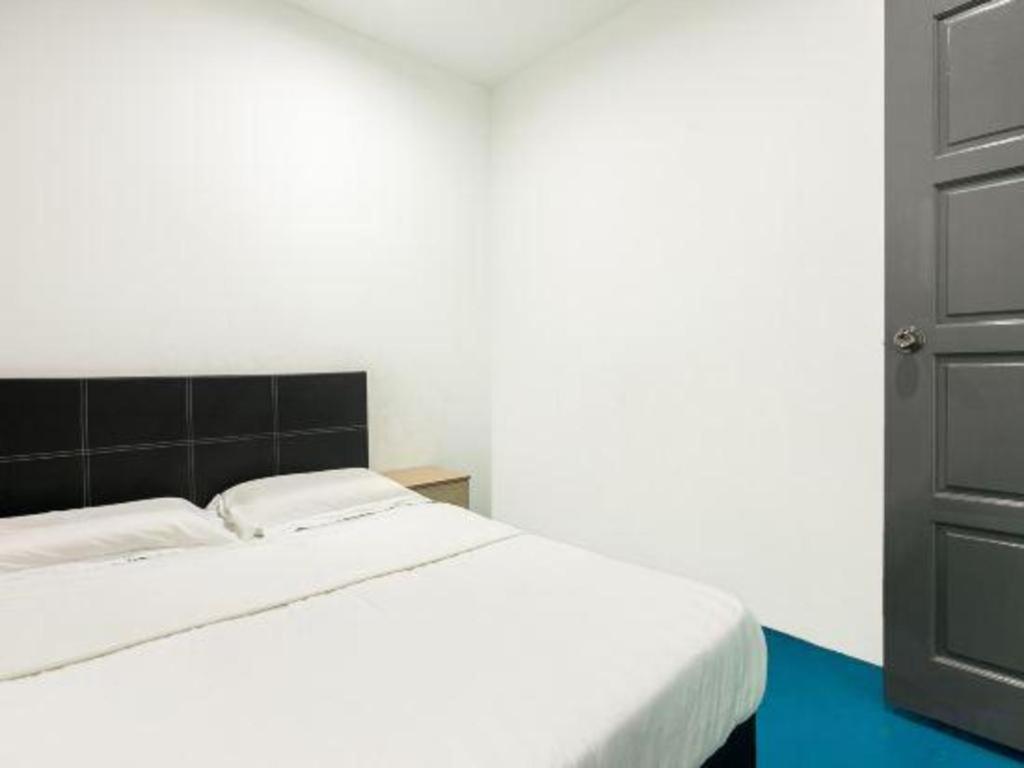 Spot On 89726 Capsule Inn Кота Кинабалу Екстериор снимка